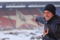 Mauro Cantoro pointing at the biggest White Star - on the north stand of Wisła stadium