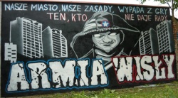 Graffiti zaprezentowane przez kibiców Wisły,przed meczem Cracovia-Stomil w sierpniu 2012 r.