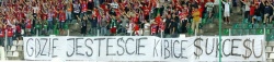 Transparent skierowany do kibiców Wisły,którzy po przegranym meczu z Levadią Talin nie jeździli na mecze ,,u siebie" w Sosnowcu.