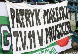 Transparent reklamujący spotkanie piłkarza Wisły P.Małeckiego z kibicami Lechii Gdańsk w Pruszczu Gdańskim.